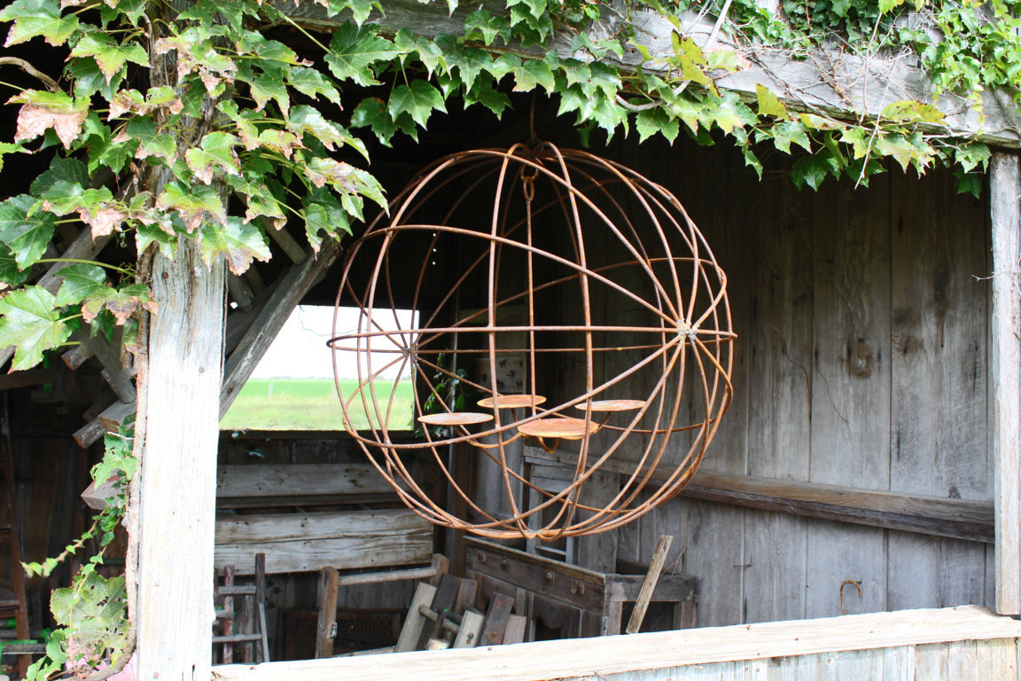 24" Wrought Iron Eclipse Chandelier Outdoor Wax Candles