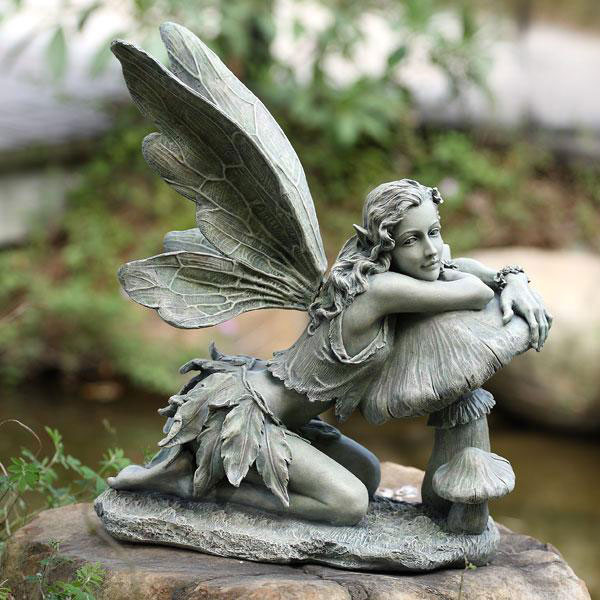 mushroom fairy statue