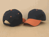 Black/Texas-Orange Two-Tone Sandwich Baseball Caps, Pro Style, PIECE PRICED.