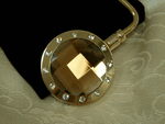 Amber crystal gold tone glittery handbag hanger Amber crystal gold tone glittery handbag hanger