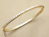 Brilliant 18k Gold over Sterling Silver Cubic Zirconia Bangle Brilliant 18k Gold over Sterling Silver Cubic Zirconia Bangle