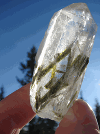 Clear Quartz Crystals with Green Tourmaline Inclusions Clear Quartz Crystals with Green Tourmaline Inclusions