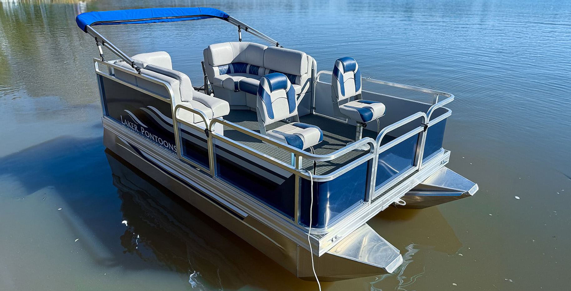 Laker 712 DLX Mini Pontoon on the water