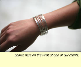 The Chai Bracelet shown on one of our clients