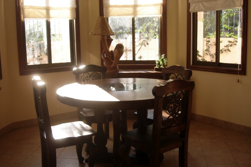 Breakfast nook with Costa Rican style wood furniture