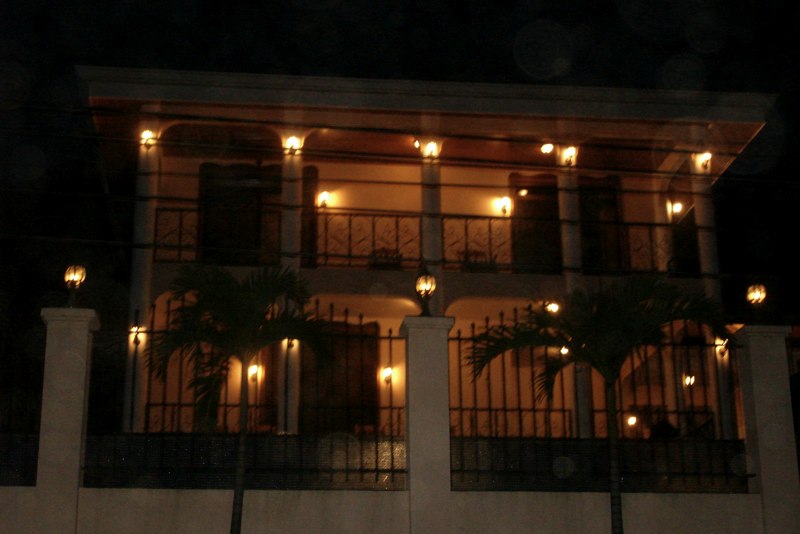 Front of Villa at night.