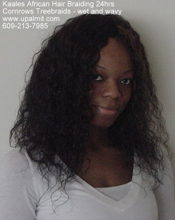 Treebraids wet and wavy with 20 inch long human hair- front view- call Kaales African Hair Braiding.