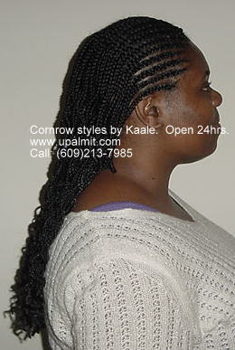 Cornrows braided in front with box braids in back, by Kaale.