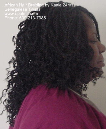 Long, curly senegalese kinky twists- side view.