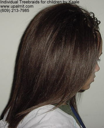 Individual treebraids with straight human hair, side view.