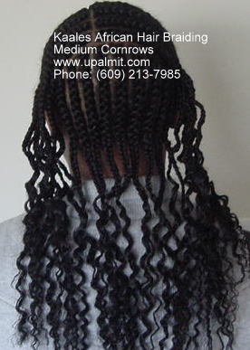 Medium cornrows, back view by Kaale.