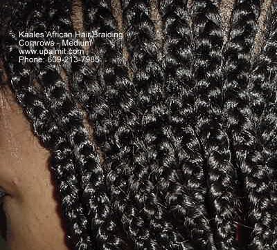 Medium cornrows, close up by Kaale.
