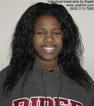 Individual treebraids with wet and wavy human hair, front view.