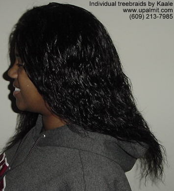 Individual treebraids with wet and wavy human hair, top.