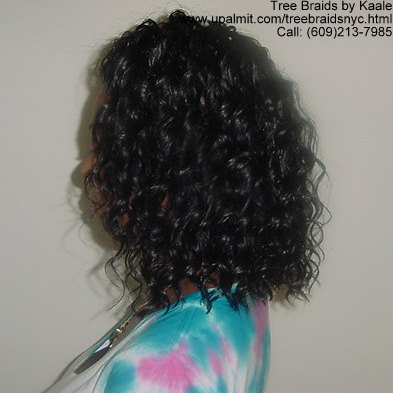 Summer, vacation, and beach wet and wavy Tree Braids- left view.