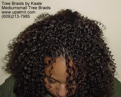 Summer, vacation, and beach Kinky curly Tree Braids- bending down.
