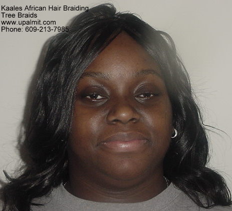 Summer, vacation, and beach straight Tree Braids, also spelled Treebraids.