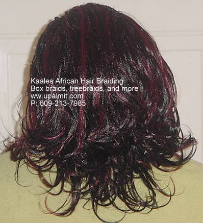 Box braids with flip up ends by Kaales African Hair Braiding NJ.