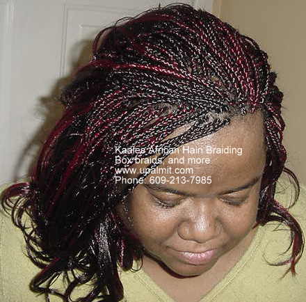 Box braids with flip up ends top view, by Kaales African Hair Braiding.