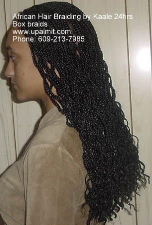 Long box braids braided to the ends by Kaales African Hair Braiding NJ.