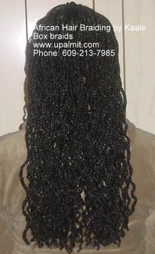 Long box braids braided to the ends by Kaales African Hair Braiding NJ.