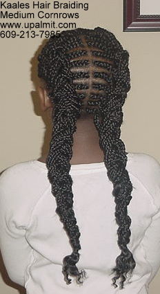 Double breasted pigtails cornrows by Kaale.