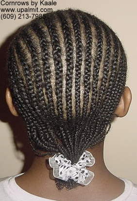 Cornrows styles with design on left side, back view.