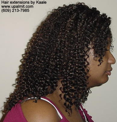 Hair extensions, hair weave, side view.