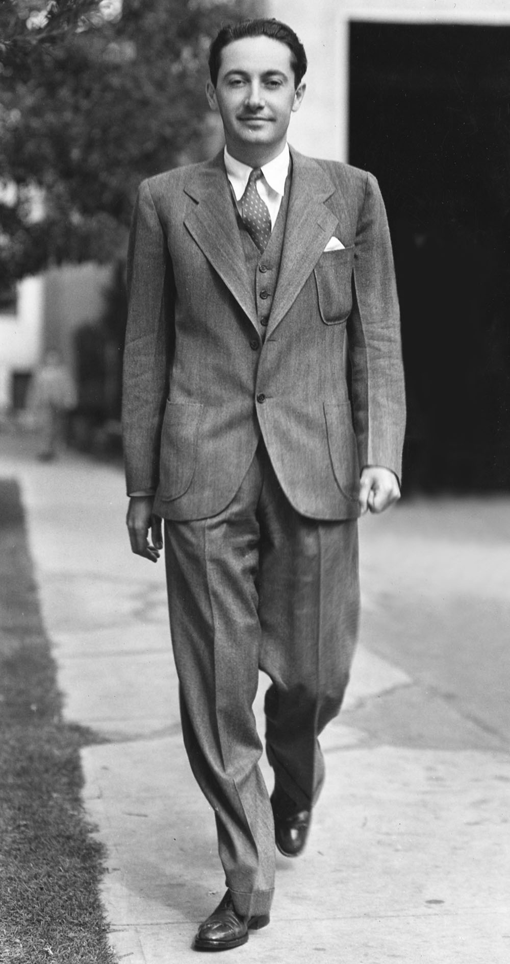 Producer Irving Thalberg walking on the MGM studio lot in 1932