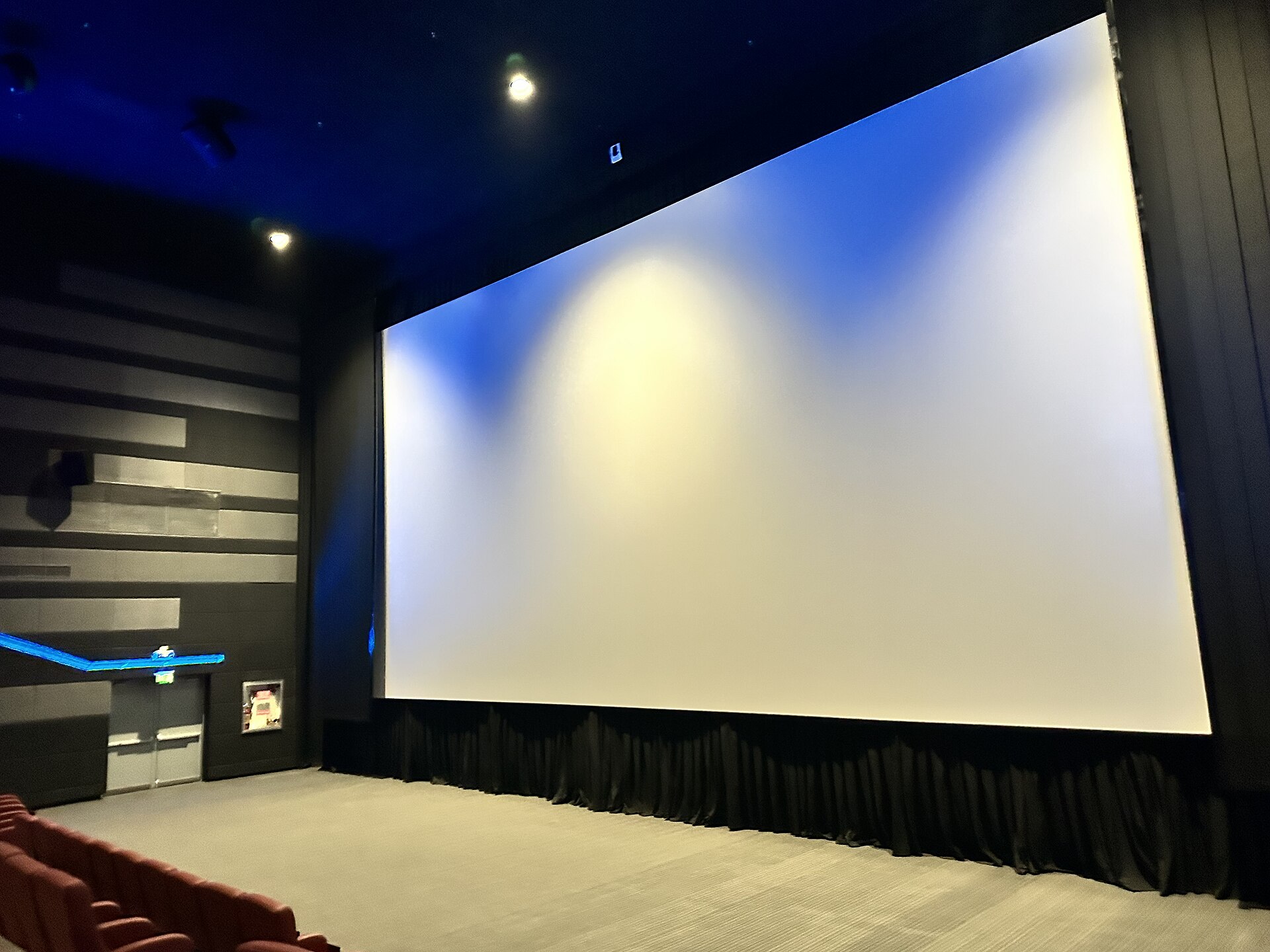 Modern Dolby Atmos-equipped movie theater auditorium