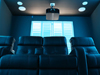 ht design clark row of 4 with middle loveseat and portable armrest accessory in blue lighted room