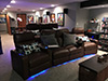ht design southampton media room seats brown curved row of 4 middle loveseat & straight row of 3 sofa w/tray table