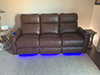 ht design southampton home theater seating brown straight row of 3 sofa led cupholders & baselighting