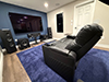 ht design sheridan row of 2 loveseat home theater recliners with tray tables and audio video set up