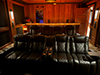 ht design waveland row of 4 with loveseat theater seats behind two rows of 2 loveseat theater seats side by side and tray table attached