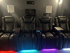 ht design waveland row of 4 home theater chairs with tray tables multi-color led cupholders and baselighting