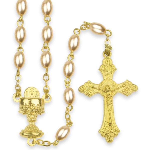An all-gold rosary with a large gold cross at the end of the beaded necklace. The beads are light-gold pearls.