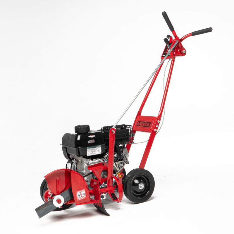 Opposite side view highlighting the heavy-duty steel chassis and 9-inch spring steel edger blade.