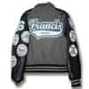 This image shows a leather black sleeve letterman jacket.  The large name patch on the back of the letter jacket is the primary artwork shown on this letterman jacket image.